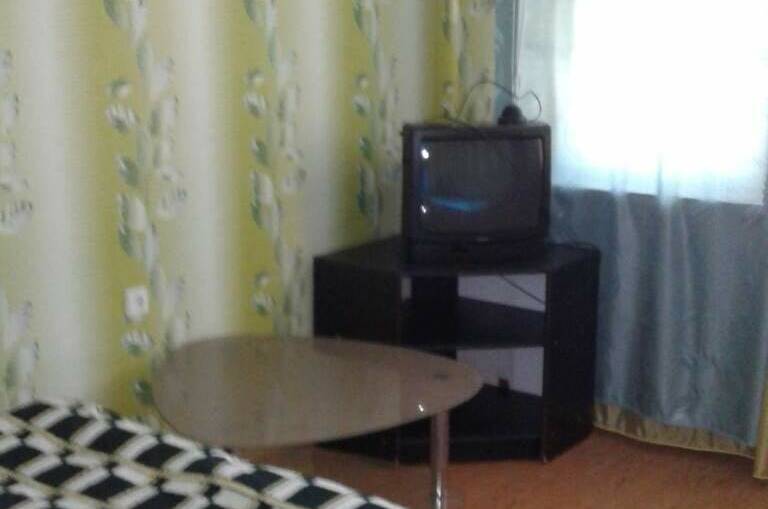 Комната с отдельной кухней и балконом